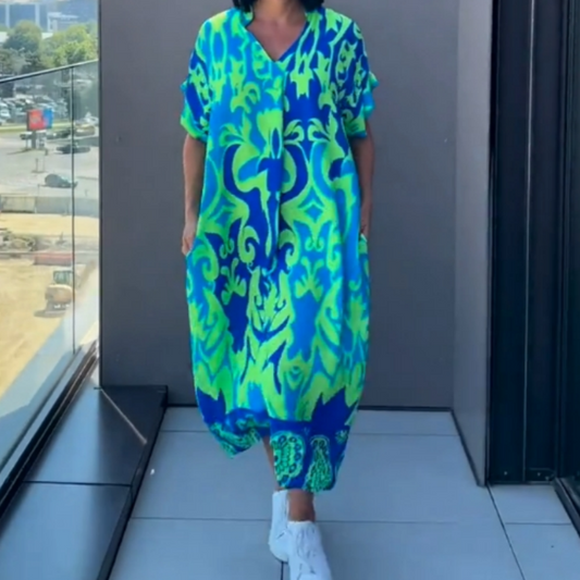 🌿Elegancka sukienka damska z nadrukiem i dekoltem w serek